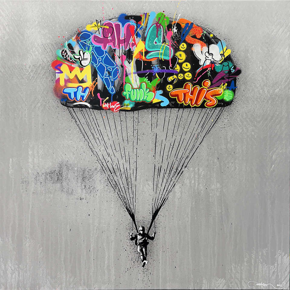 A parachutist hangs beneath a canopy filled with colorful graffiti on a grey square canvas.
