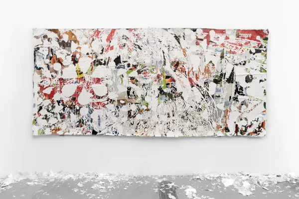 Cal (2026) by Vhils: Hand-carved advertising posters.