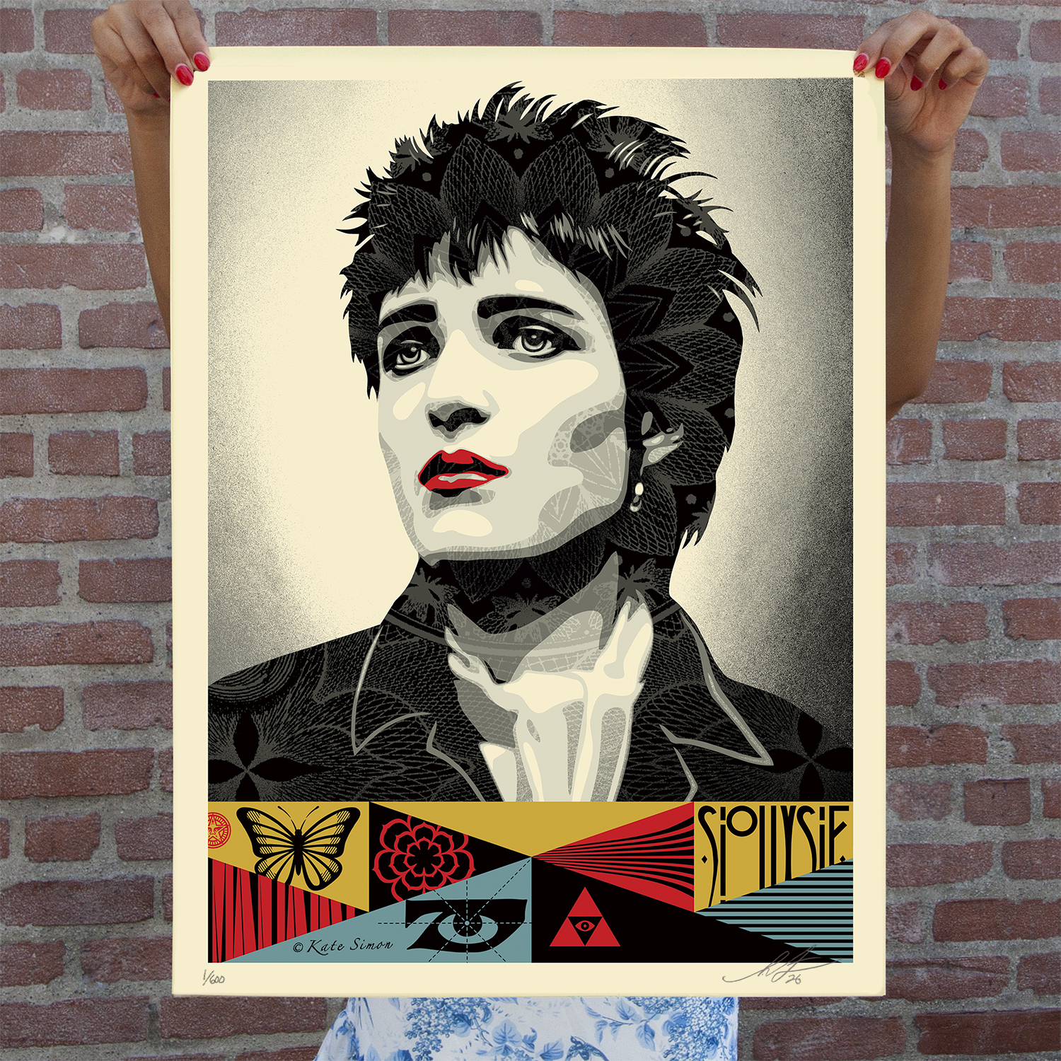 Shepard Fairey Siouxsie, 1978 screen print held against a brick wall