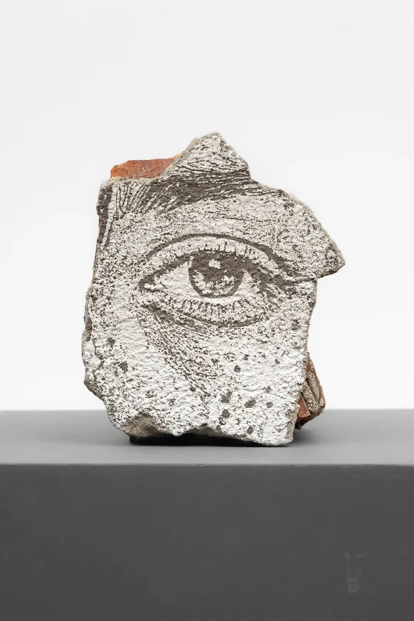 Estrato Series #01 (2026) by Vhils: Laser-engraved fragment from demolished building (brick, plaster, concrete, paint).