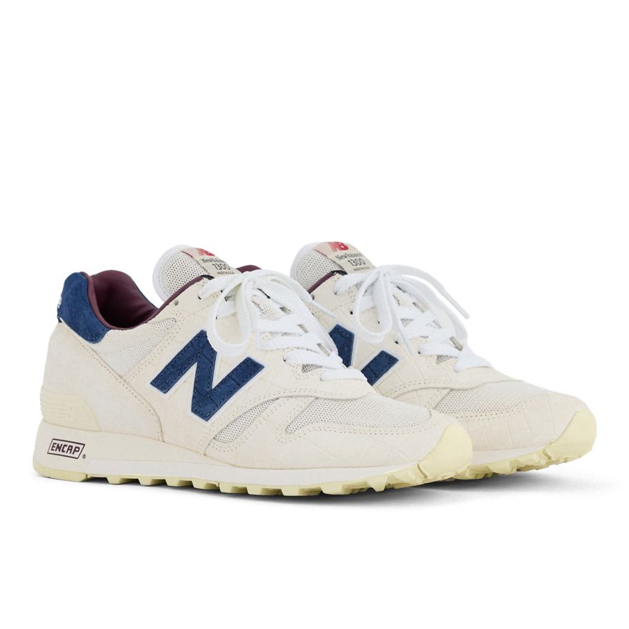 New Balance Made in USA 1300 U1300SS in Angora, Blue Oyster and Mulled Wine, shown as a pair on a white background.