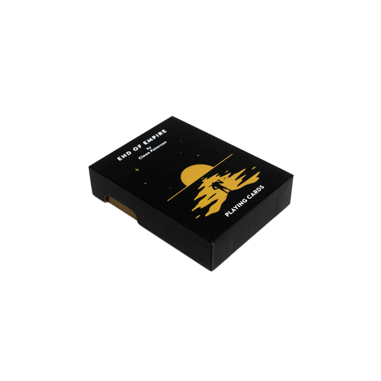Black End of Empire playing-card package with gold artwork and white title on a white background.