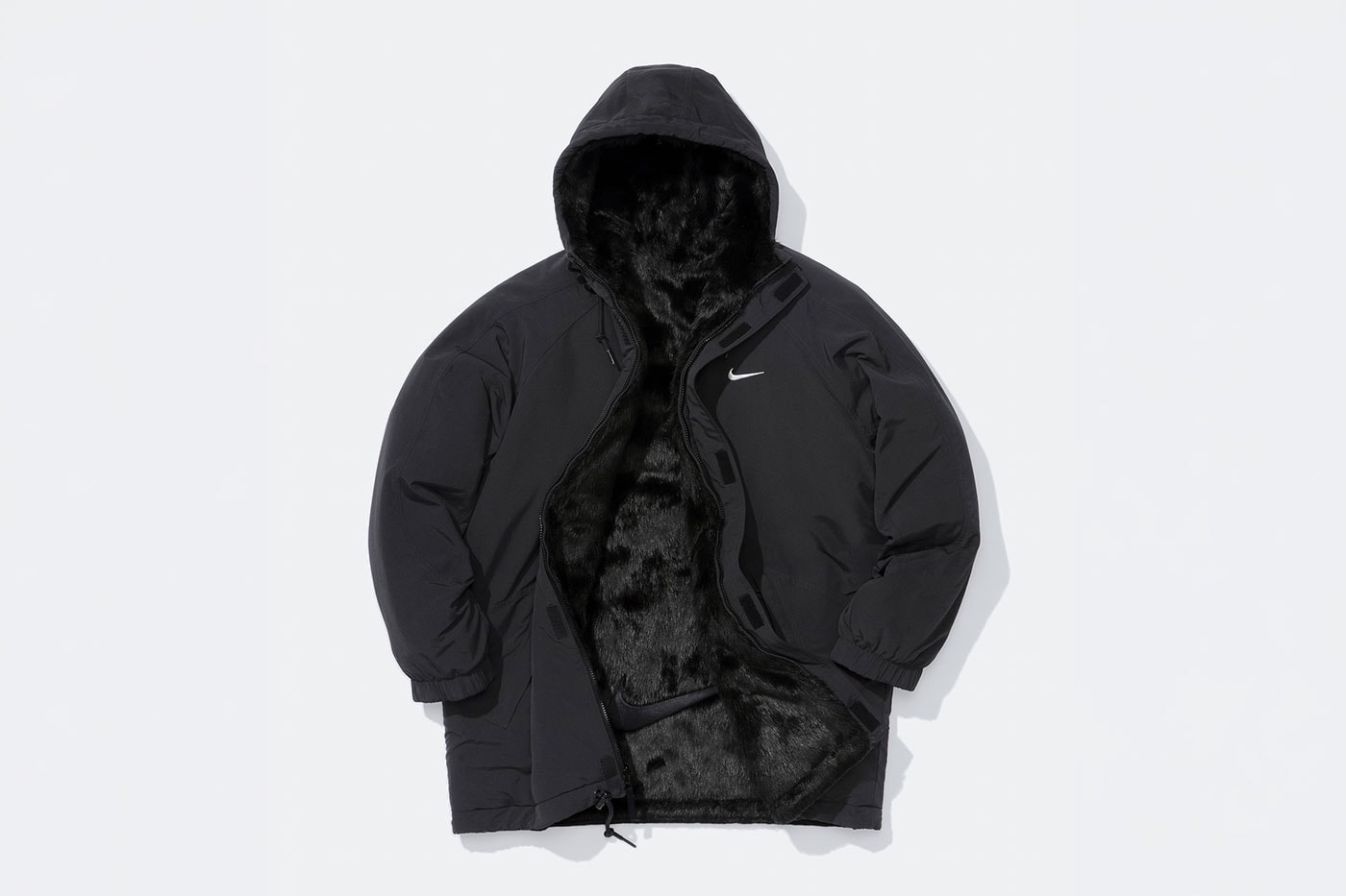 Black Supreme/Nike Faux Fur Reversible Parka with the front open to show its black faux-fur reverse side.