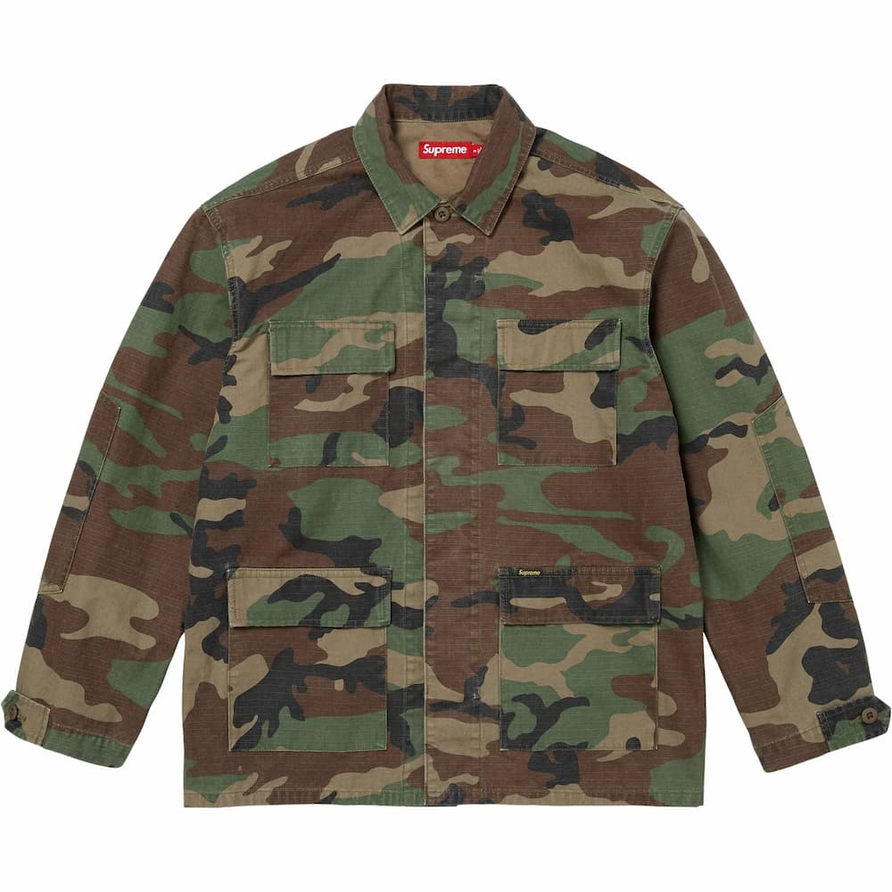 Supreme Ripstop BDU Shirt Jacket in Woodland Camo, front view with four flap pockets and concealed button placket.